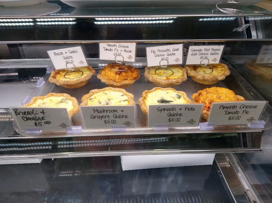 a display with several savory quiches